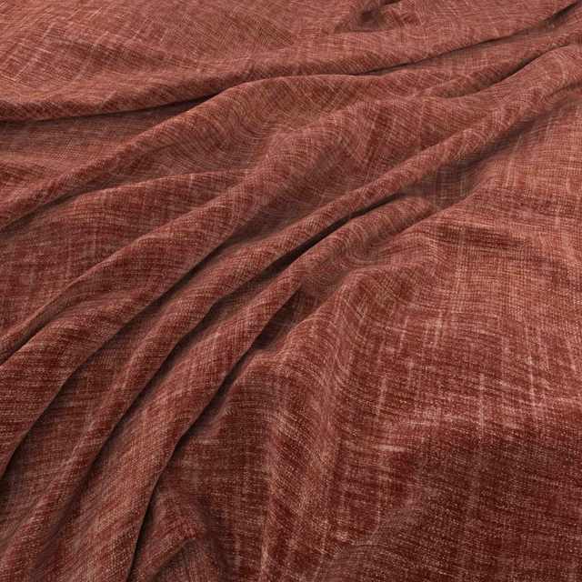 Warm brick-red woven fabric with irregular crosshatch texture in softly draped folds