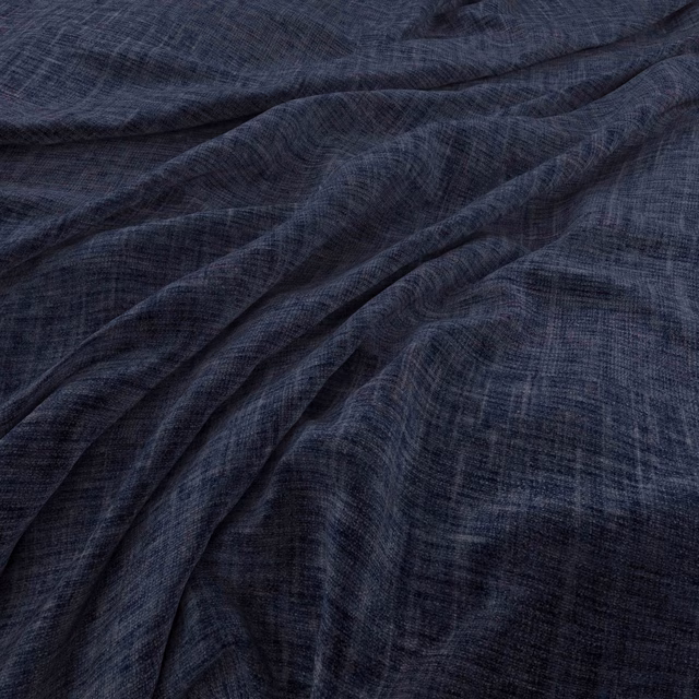 Dark indigo woven textile with fine crosshatch texture gathered in soft folds