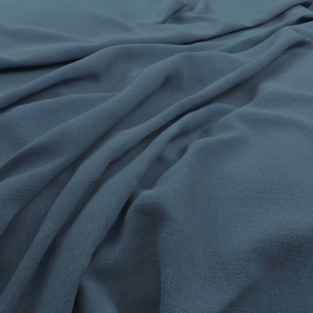 Deep juniper blue-green fabric with fine weave, softly gathered into fluid folds