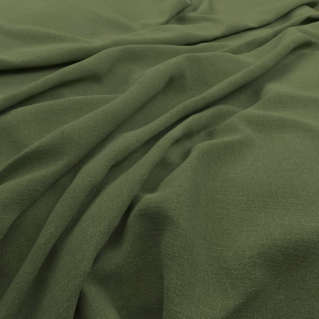 Close-up of muted kiwi olive fabric showing fine weave and fluid folds