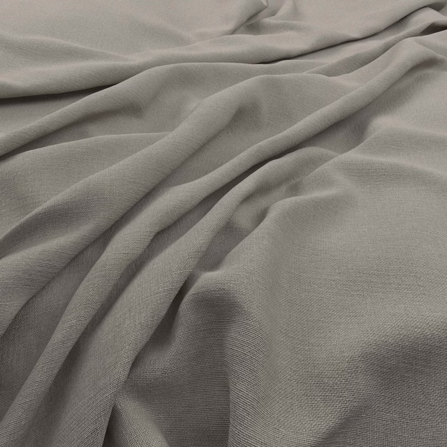 Soft taupe-grey plain weave fabric draped in fluid folds with subtle texture