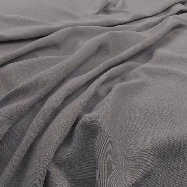 Close-up of cool smoke-grey fabric with fine weave and fluid draped folds
