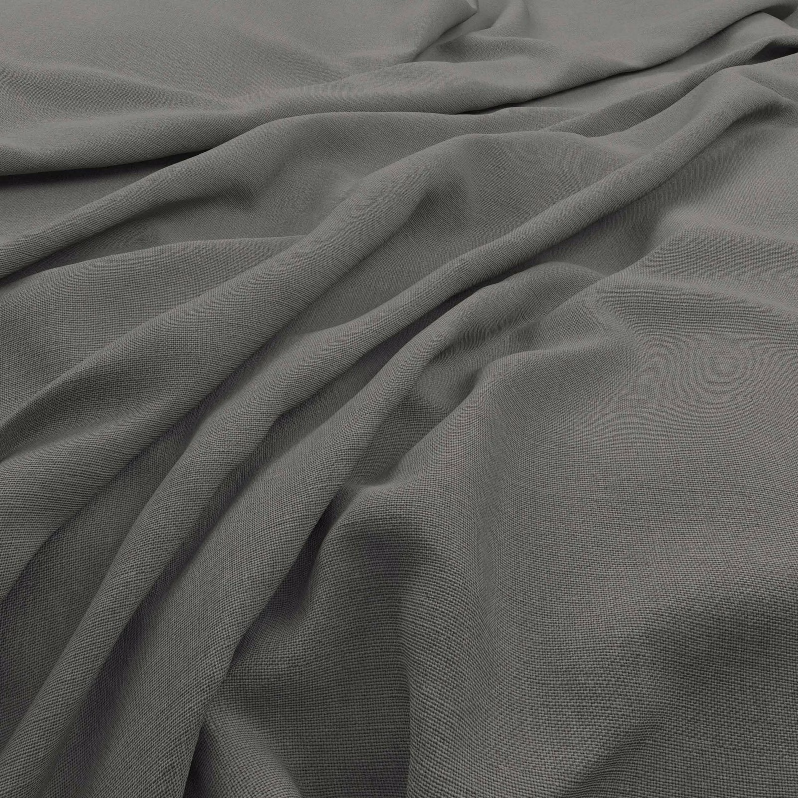 Close view of Koki Stone’s cool grey fine weave falling into soft folds