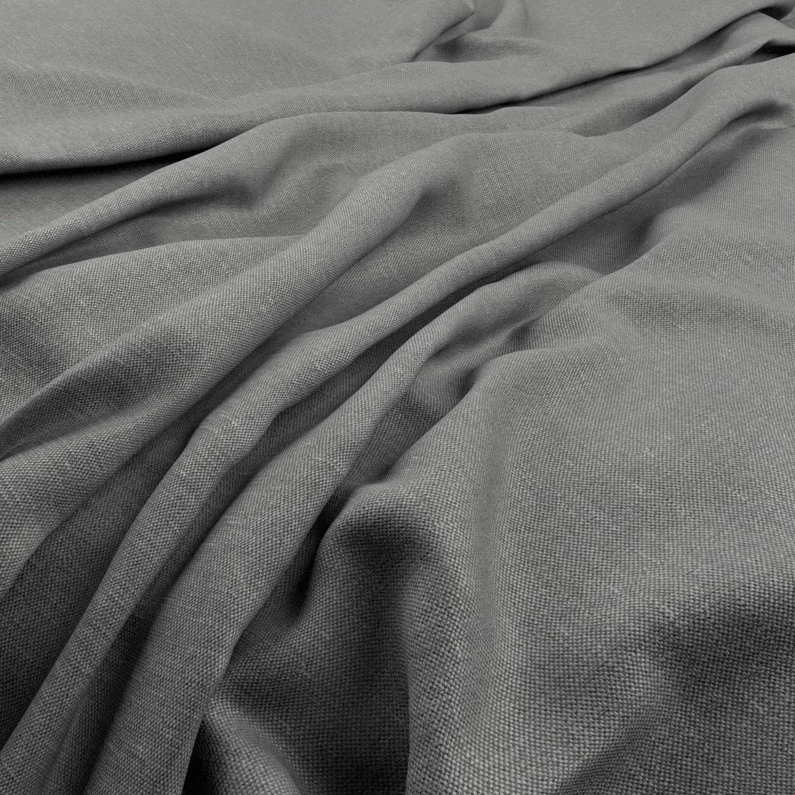 Cement-grey finely woven fabric falling into soft, fluid folds