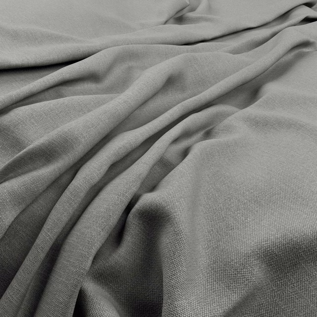 Soft cool-grey woven fabric gathered into fluid folds with a fine texture