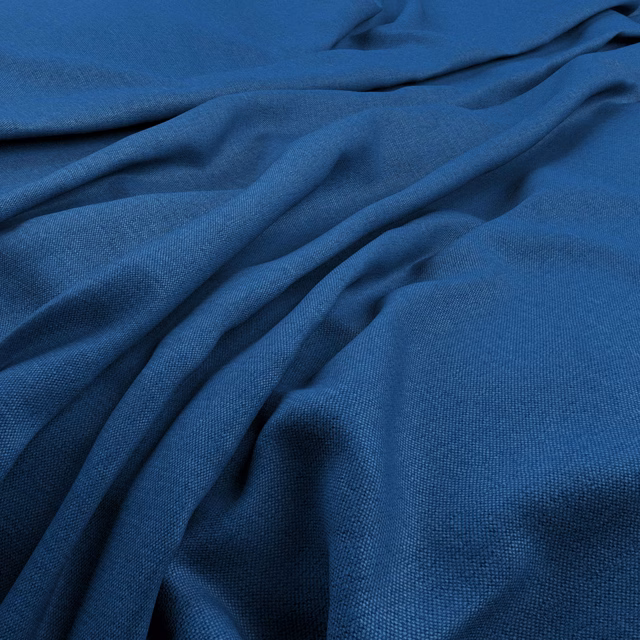 Deep cobalt-blue plain weave textile gathered into soft, dimensional folds