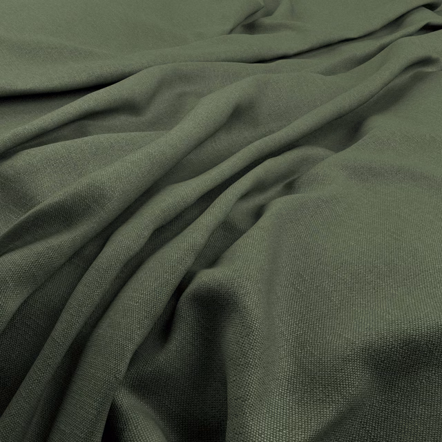 Muted fern-green fabric showing a fine weave across softly folded cloth