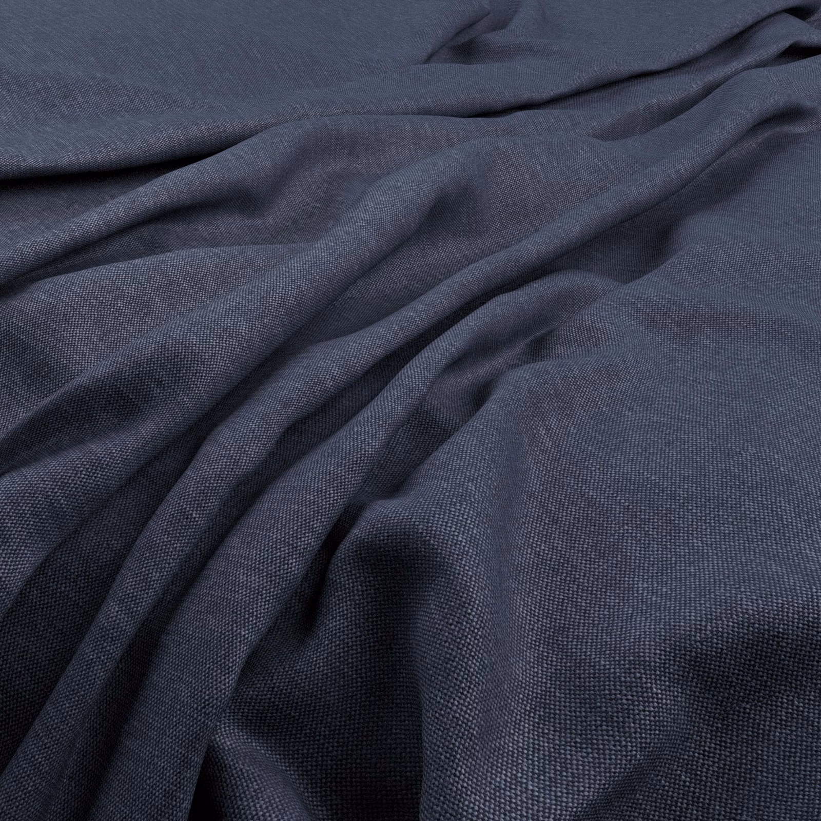 Deep indigo plain weave fabric gathered into soft, shadowed folds with fine texture