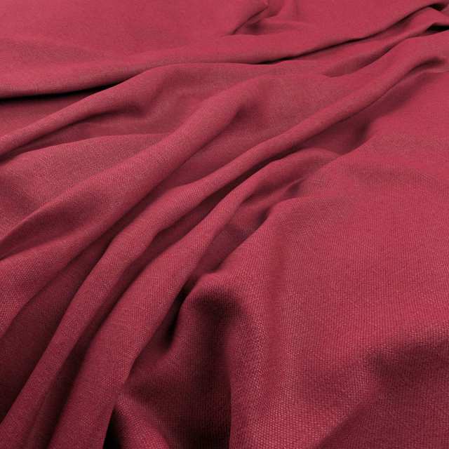 Deep raspberry-pink plain weave fabric gathered into softly shadowed folds
