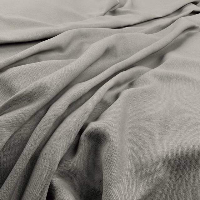 Close view of smoke-grey fabric with a fine weave gathered into soft folds