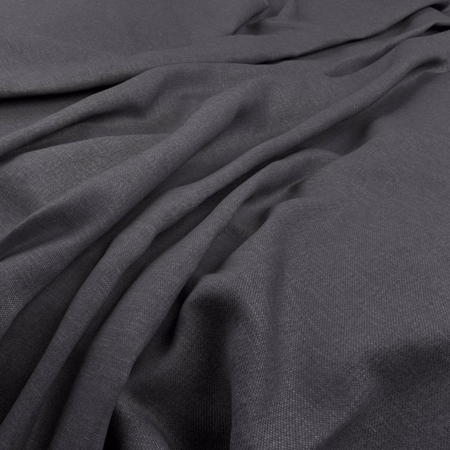 Charcoal steel-grey fabric with a fine weave arranged in soft flowing folds