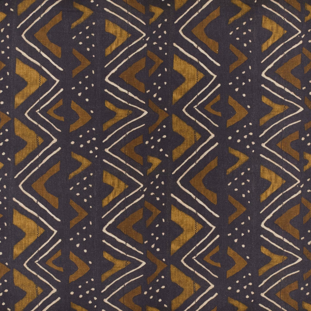 Charcoal Kuba textile with ochre geometric shapes, ivory lines and dotted motifs