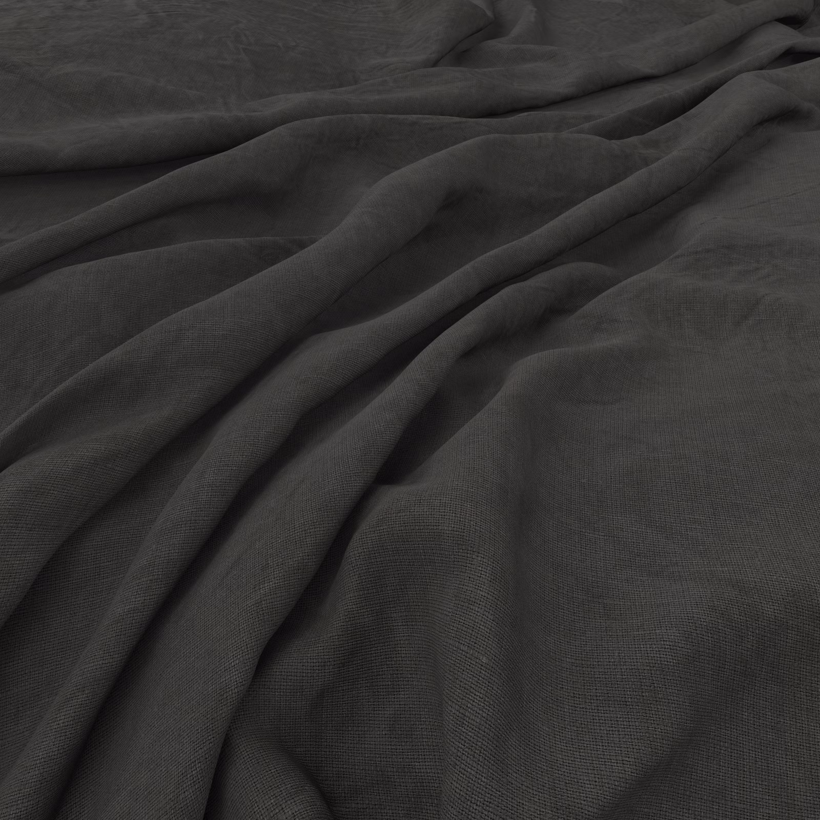 Deep charcoal grey plain-weave fabric draped in softly textured, fluid folds