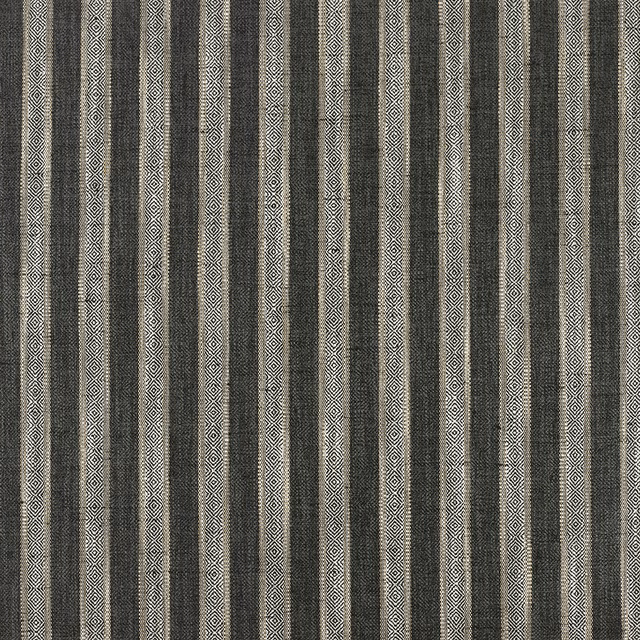 Charcoal woven fabric with ivory geometric diamond stripes in a vertical pattern