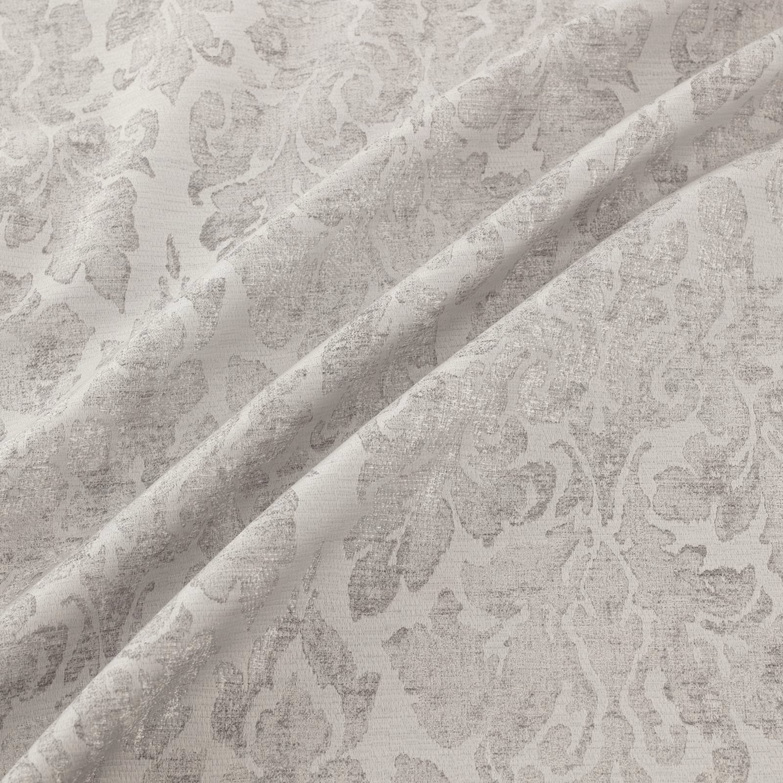 Pale silver-grey damask with tonal floral motifs and a softly reflective folded weave