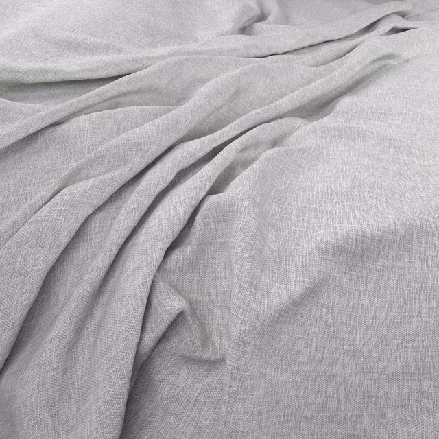 Pale glacier-grey woven fabric gathered into soft, fluid folds