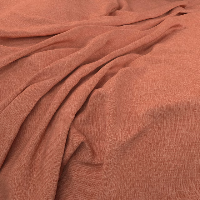 Muted terracotta plain weave with fine texture and soft rumpled folds