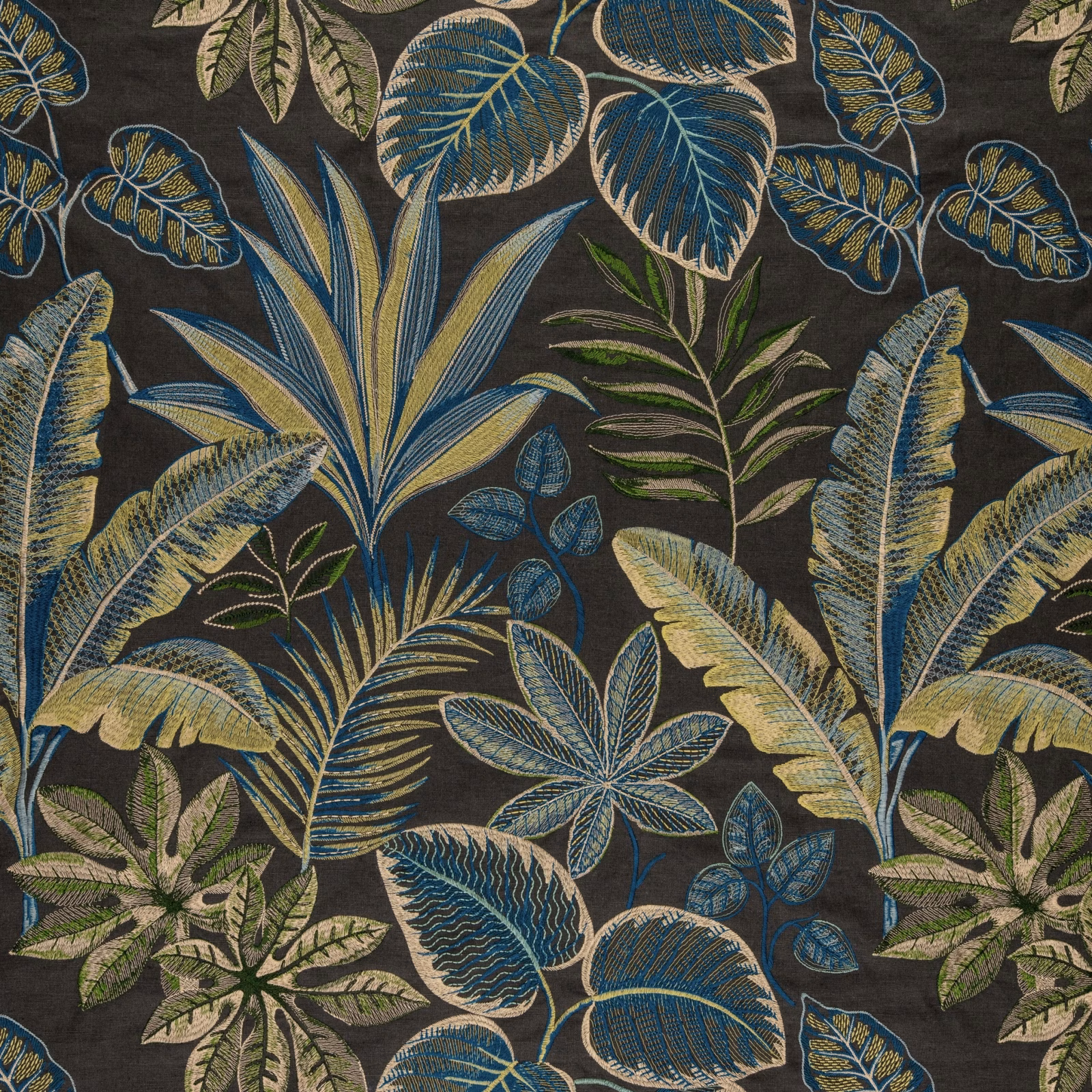 Charcoal botanical fabric with blue-green leaves, ochre veins and layered foliage
