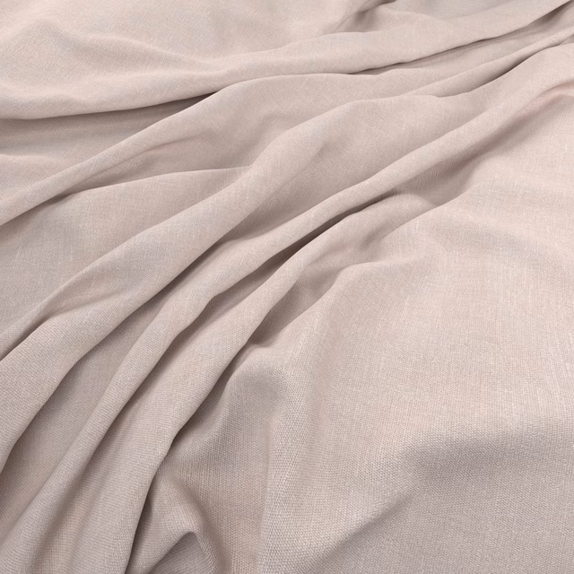 Dusty blush-taupe fabric showing a fine plain weave in soft gathered folds