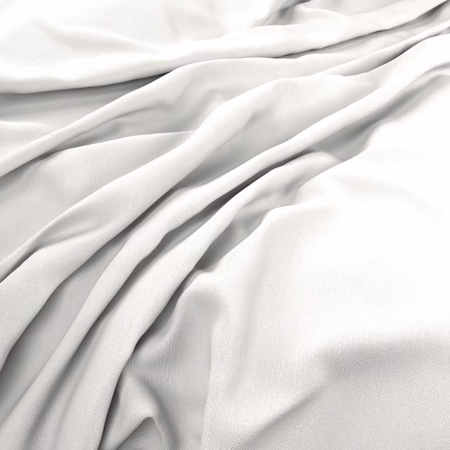Chalk-white fabric in fluid folds, showing fine weave and a subtle satin sheen