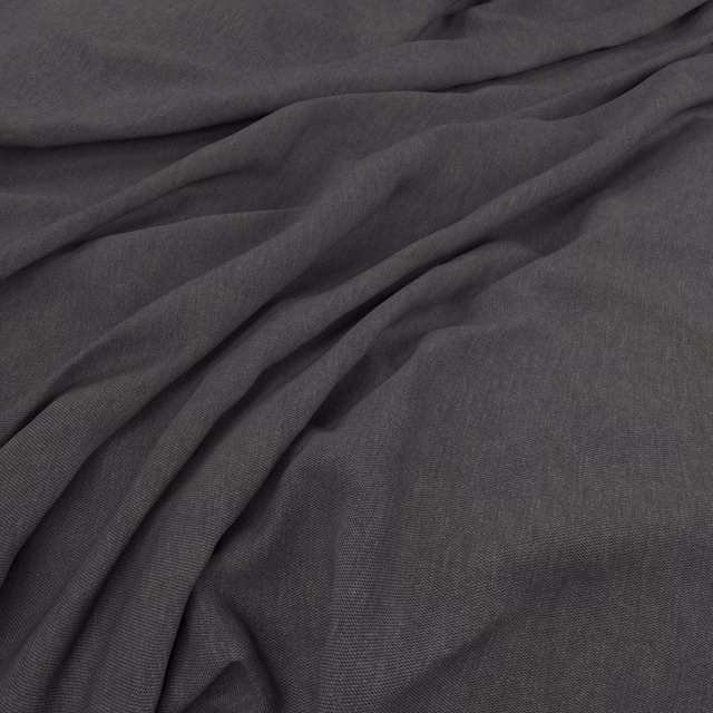 Deep charcoal-grey Loire fabric with a fine weave, softly folded across the swatch