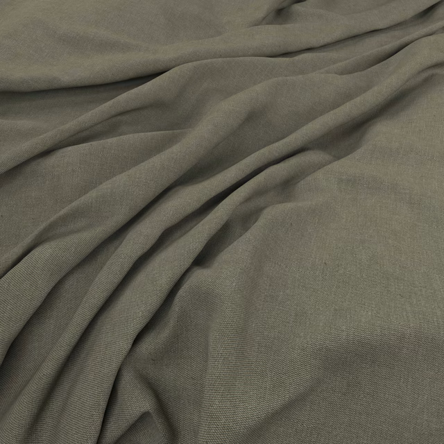 Muted olive-grey plain weave fabric gathered into soft, fluid folds