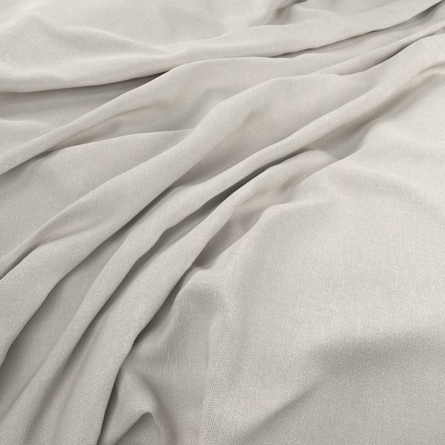 Soft natural ivory fabric with a fine plain weave in flowing folds