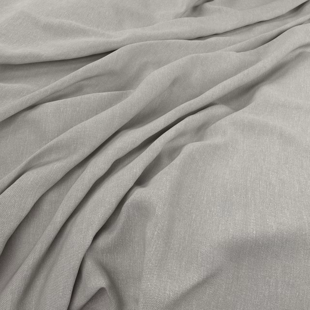 Soft smoke-grey plain weave fabric draped in loose folds with a fine texture