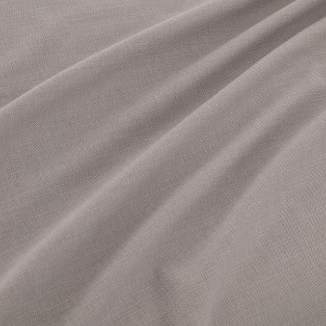 Cool ash-grey plain weave with fine texture gathered into soft diagonal folds