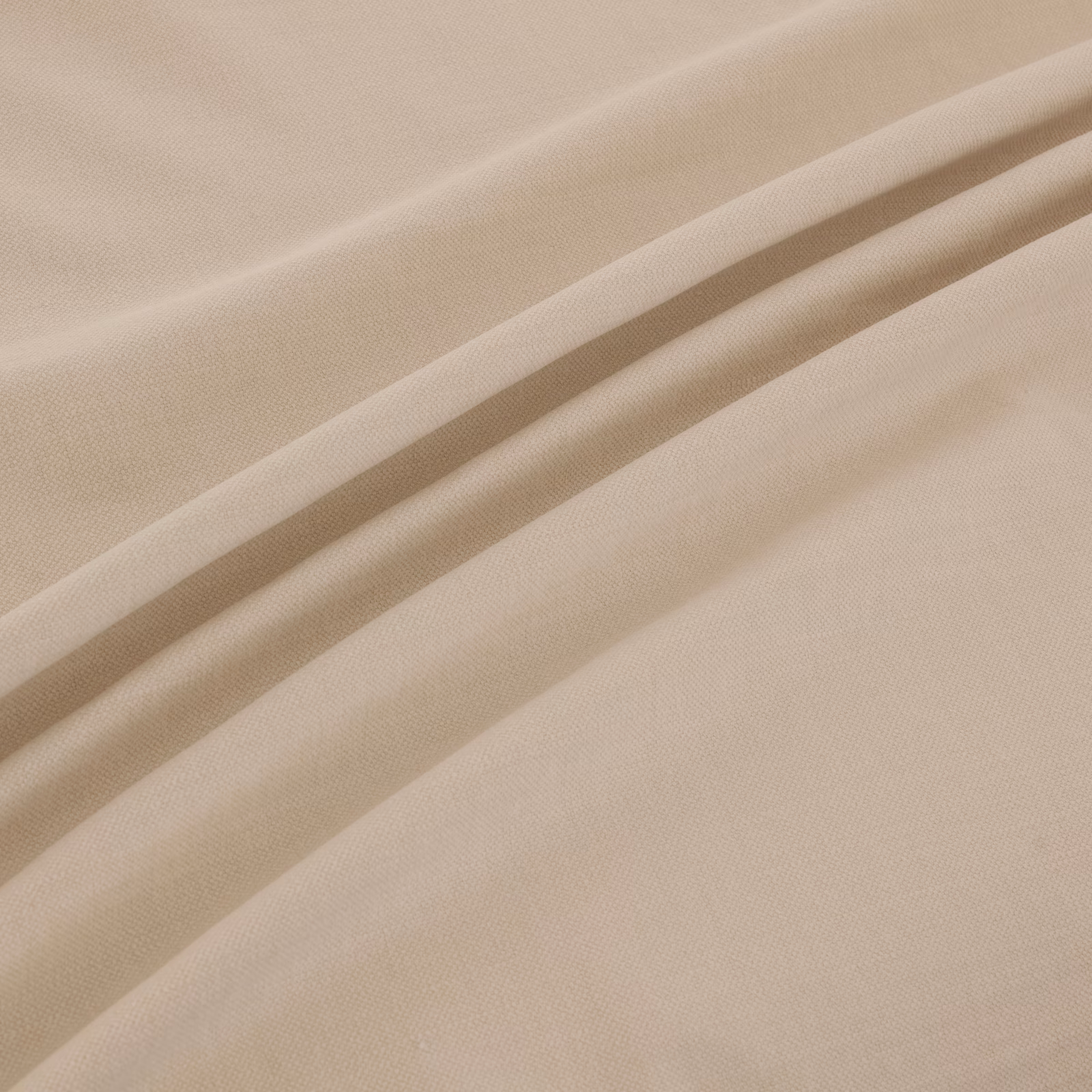 Warm champagne-beige plain weave fabric gathered into soft diagonal folds