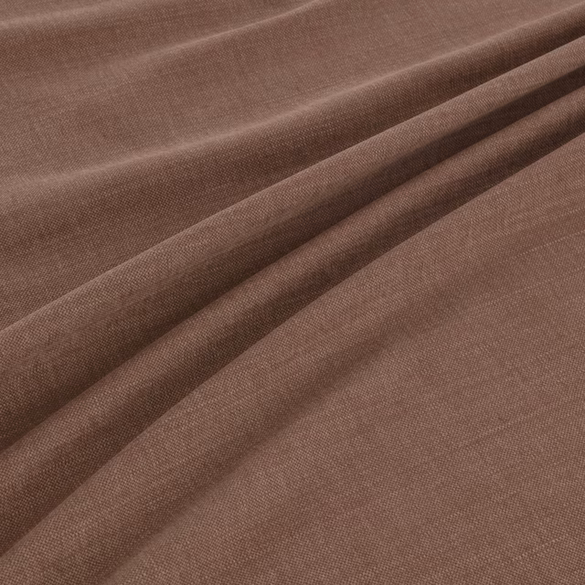 Warm cinnamon-brown woven textile with fine texture and relaxed diagonal folds