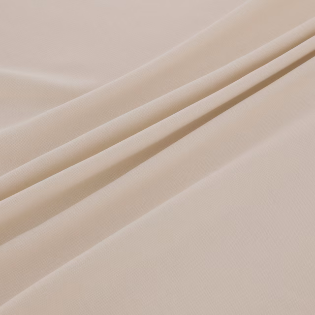 Warm ivory fine weave shown in soft diagonal folds with subtle linear texture