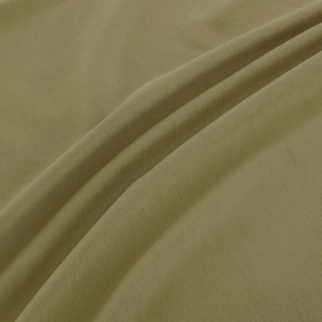 Muted olive-green finely woven fabric gathered into soft diagonal folds