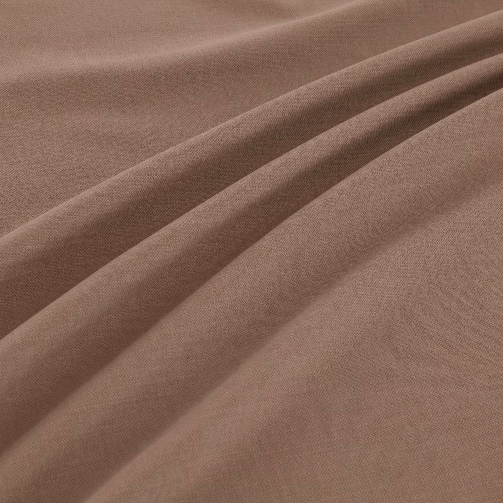 Muted mushroom taupe plain weave fabric shown in soft diagonal folds