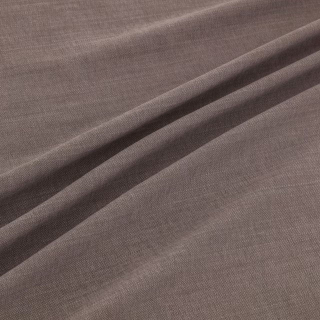 Cool pewter taupe fabric with a fine woven surface and soft diagonal folds
