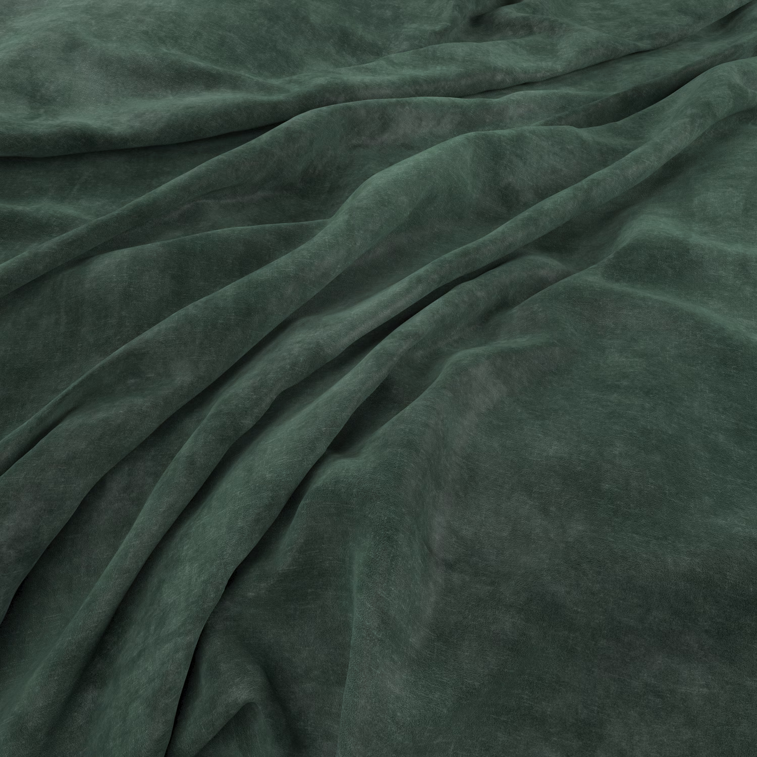 Folded plain velvet in deep emerald green showing plush, softly varied nap