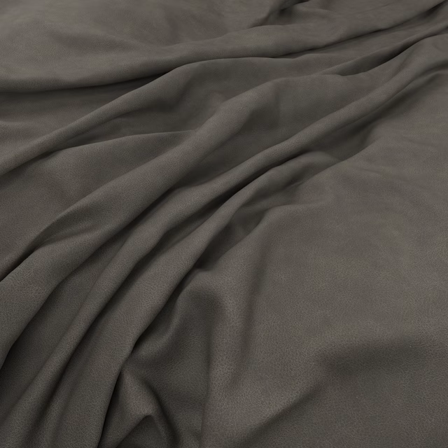 Deep charcoal-plum fabric with a fine pebbled surface gathered into soft folds