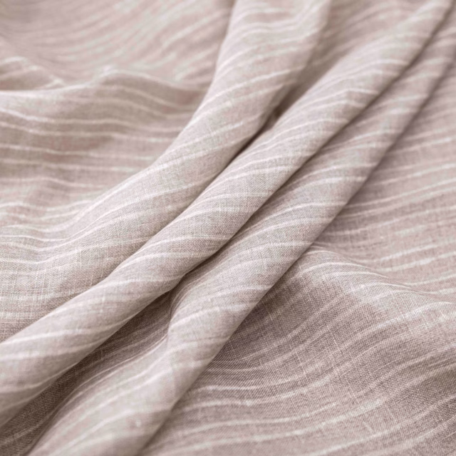 Pale taupe textile with irregular horizontal lines gathered into soft folds