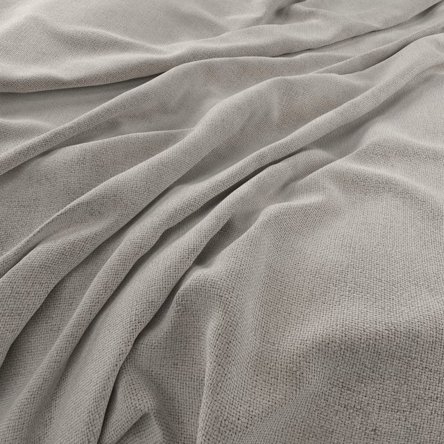 Pale greige woven fabric with fine texture gathered into soft flowing folds