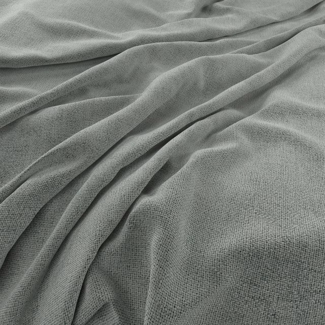 Muted seafoam green woven fabric gathered into softly shadowed folds