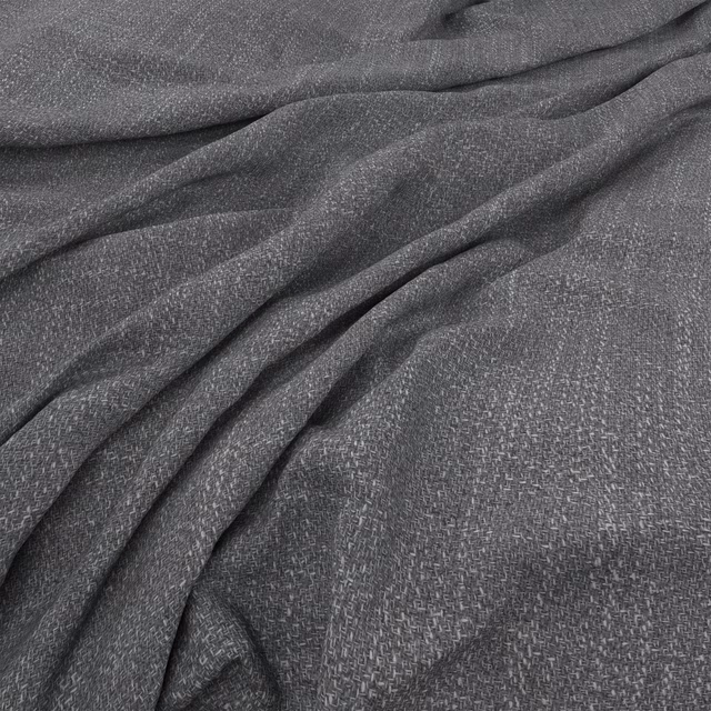 Dark storm-grey woven textile showing fine crosshatched texture and softly folded drape