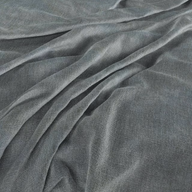 Cool airforce blue-grey woven fabric gathered into fluid, softly highlighted folds