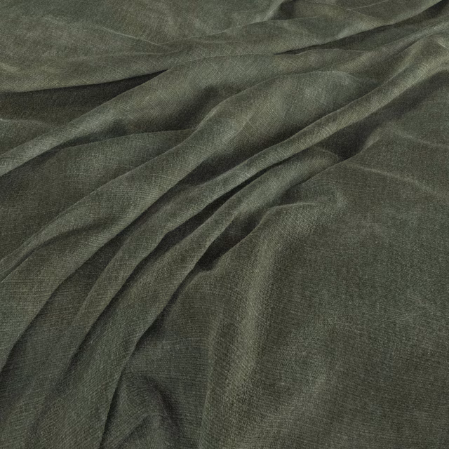 Muted alpine green plain-weave fabric gathered into softly shaded folds