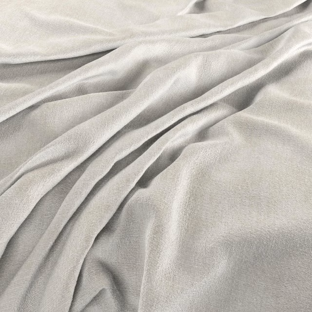 Fluid folds of pale chalk ivory fabric with a fine softly textured weave