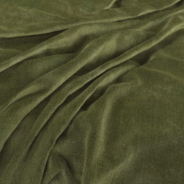 Deep olive-green fabric with a softly lustrous nap gathered into shadowed folds