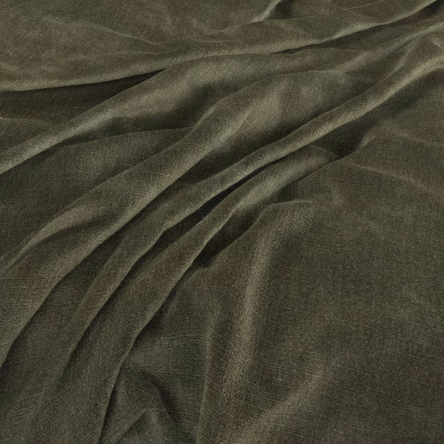 Deep conifer-green woven fabric draped in soft folds with subtle crosshatch texture