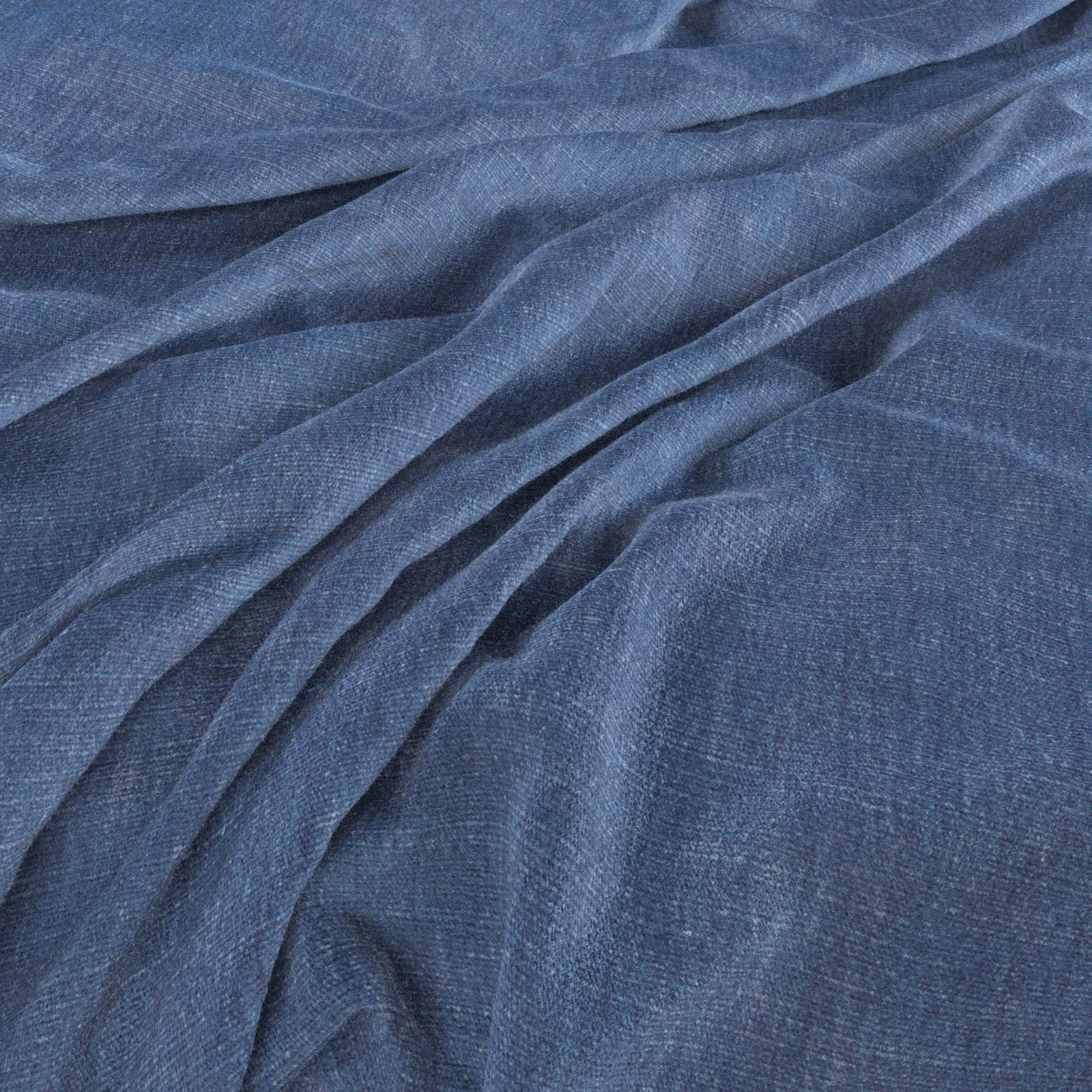 Close-up of muted denim-blue woven fabric gathered into softly shadowed folds