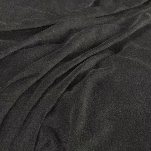 Dark slate-grey fabric with a fine weave gathered into soft, shadowed folds