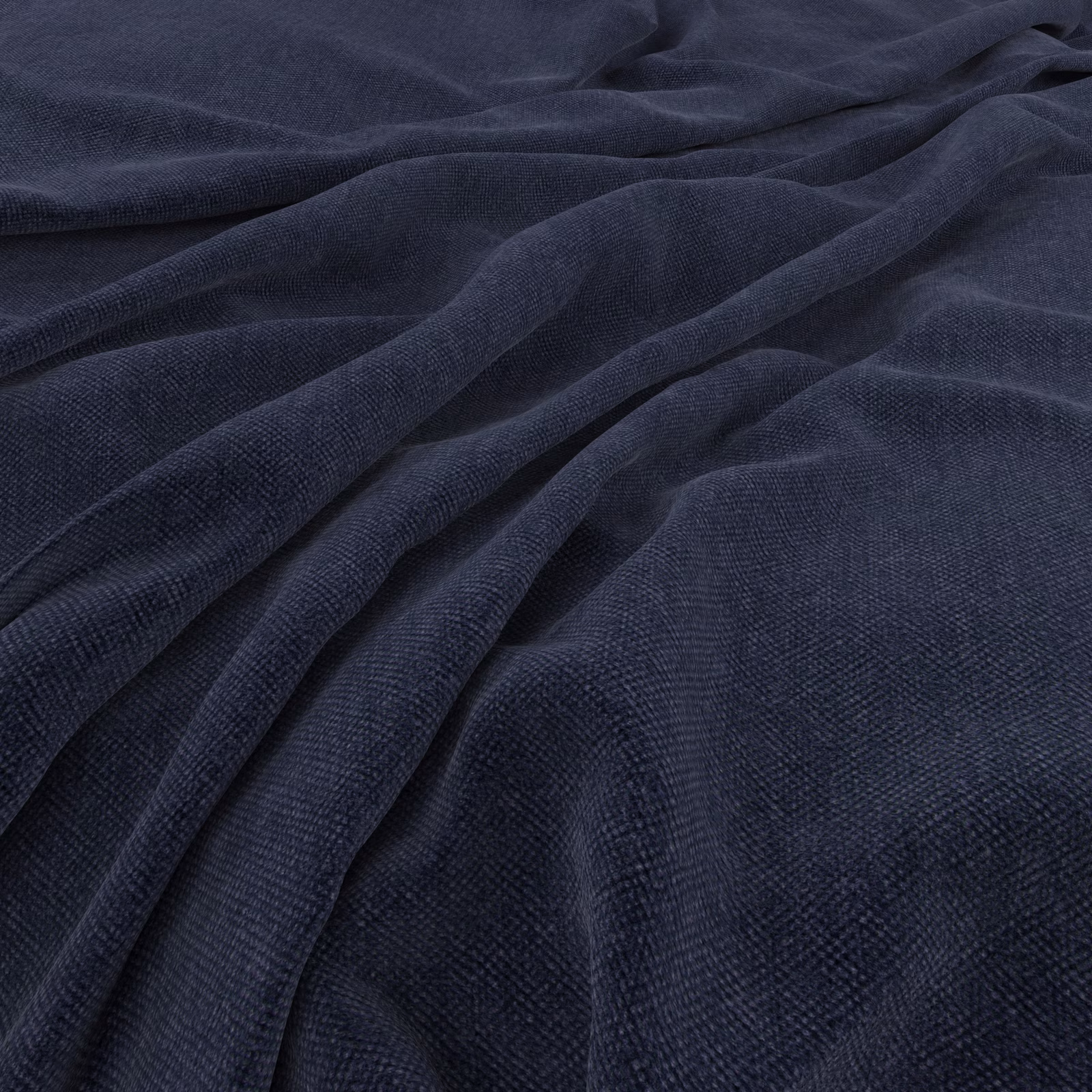 Deep denim blue fabric showing fine woven texture across softly gathered folds