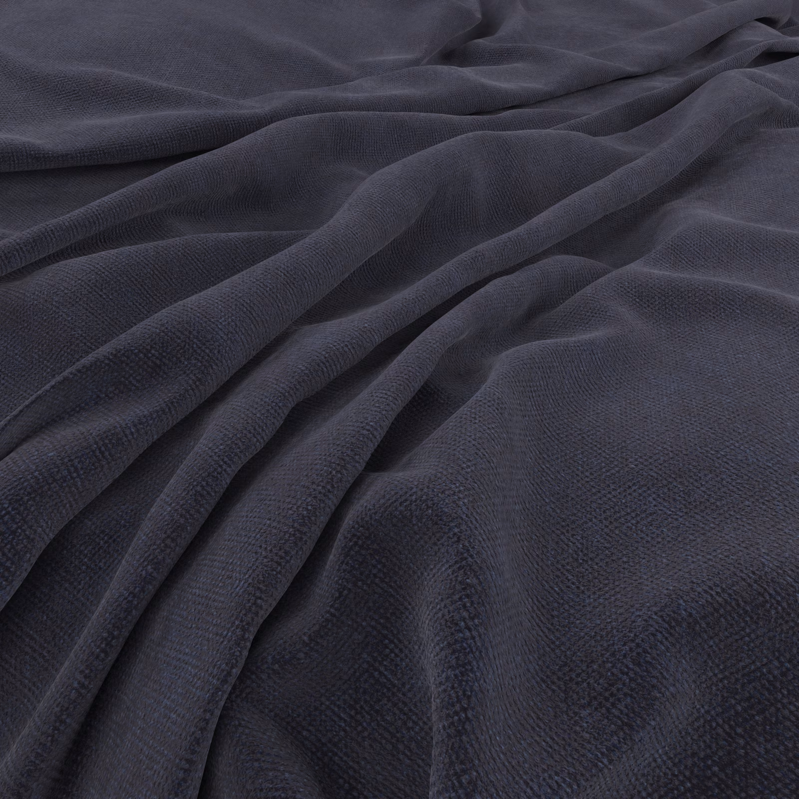 Deep indigo fabric with fine cross-textured weave falling into soft folds
